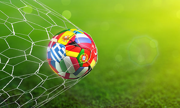 football hits the back of the net