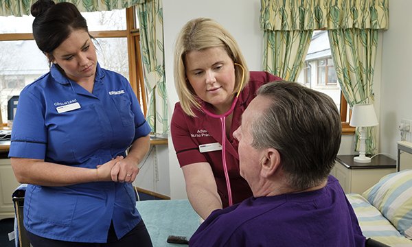 Advanced nurse with patient