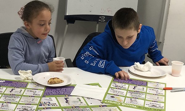 girl and boy at workshop
