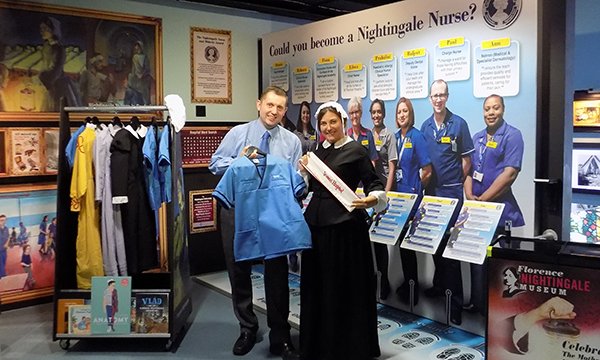 Florence Nightingale Museum director David Green, left, with Emma Hixson, a performer, in the museum's new family corner
