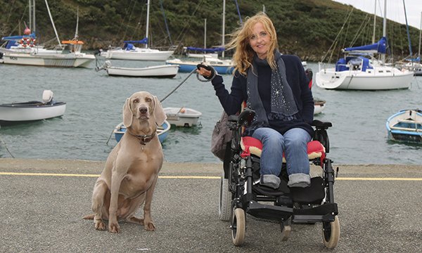 Sepsis survivor and former nurse Jayne Carpenter out with her dog