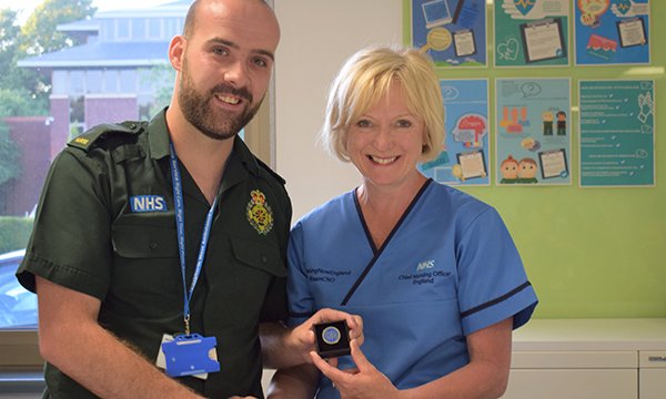 Craig Hayden award-winning advanced nurse practitioner with chief nursing officer Ruth May