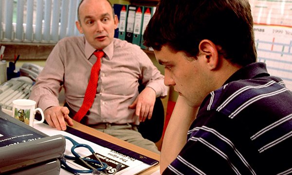 Pictures shows a GP talking to a young man. People with cancer who skip urgent referral appointments for their symptoms are more likely to die within a year of diagnosis, researchers say