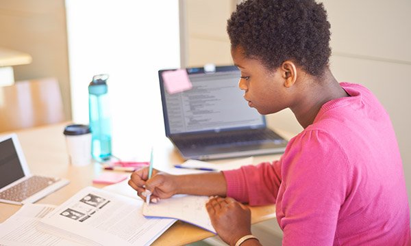 Picture shows a woman studying. Many nurses are using holidays to do continuing professional development and paying for it themselves, according to a survey by Cancer Nursing Practice.