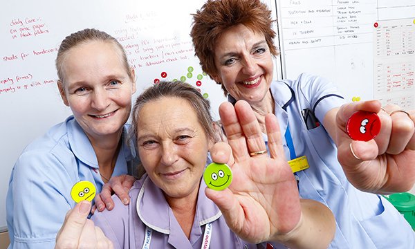 East Kent community trust staff use the magnet faces to help discuss their feelings during team huddles