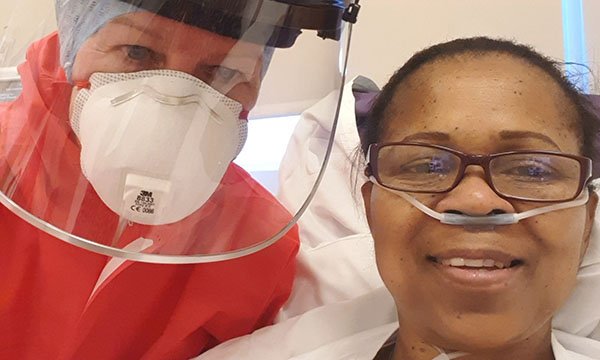 Cath Simpson of ICU at University Hospital of North Tees with nurse and COVID patient Millie Magadlela