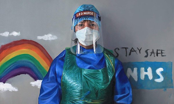 Picture shows the painting of emergency nurse Kate Hunt by her husband Andrew