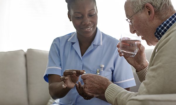 Nurse talking to patient