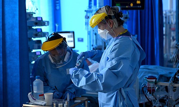 critical care staff in ICU at Royal Papworth Hospital working in PPE