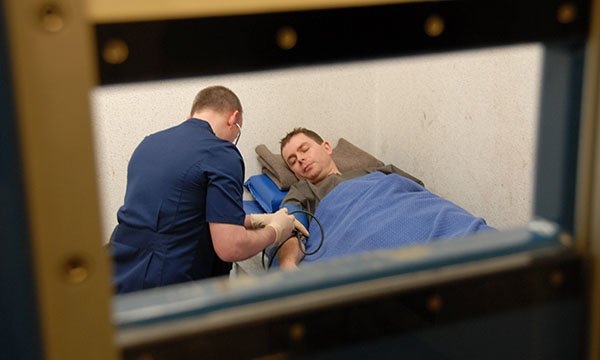 Custody nurse with a detainee