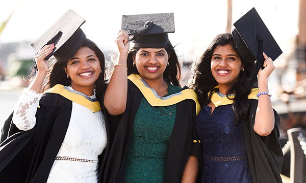 Three quadruplet sisters graduate in nursing together and now work at the same hospital