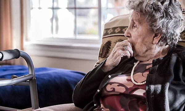 Picture of a care home resident looking perplexed