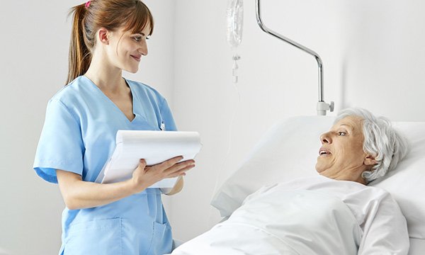 Nurse talking to patient