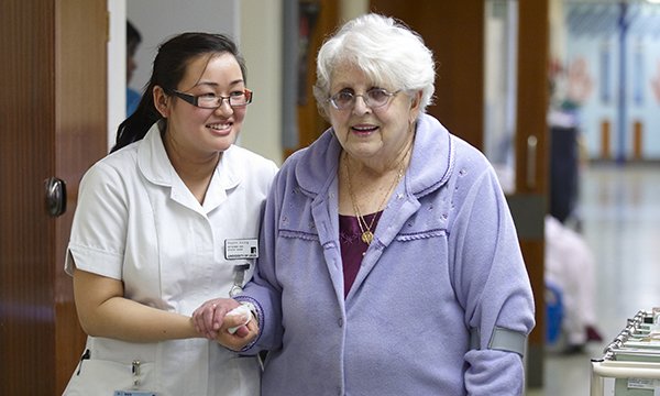 Overseas nurse with patient