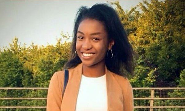 Picture of Owami Davies smiling at the camera, taken before her disappearance and subsequent discovery alive and well