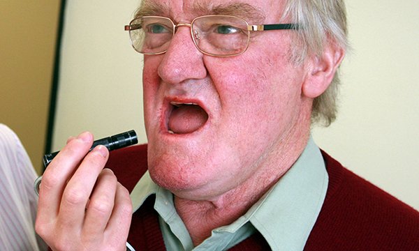 Care closer to home: evaluation of a pilot follow-up and rehabilitation service redesign for patients with head and neck cancer