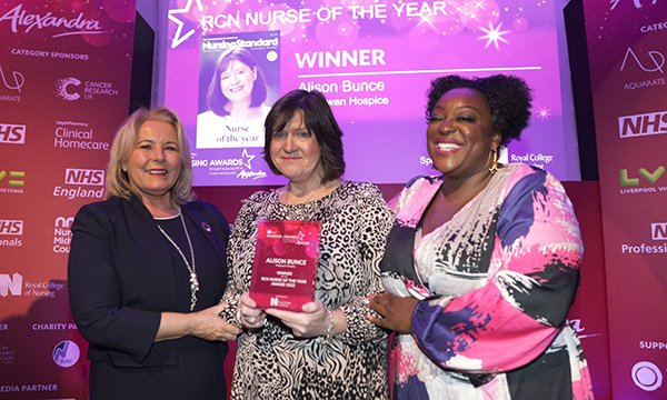 RCN Nurse of the Year 2022 Alison Bunce (centre), with RCN general secretary Pat ​Cullen (left) and comedian Judi Love, who hosted the awards ceremony