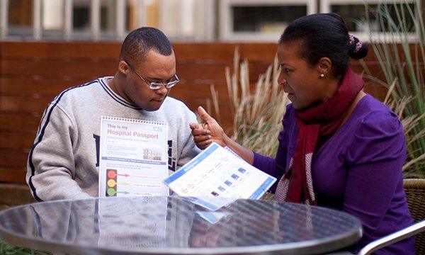 Learning disability consultant nurse talks to a service user of minority ethnic origin: people from ethnic minority backgrounds with learning difficulties face double discrimination