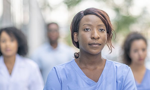 A young nurse of Asian ethnicity