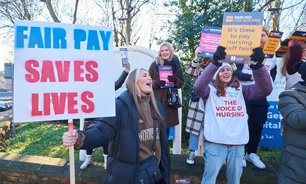 Nurses on a picket line holding placards at Northern General Hospital, Sheffield