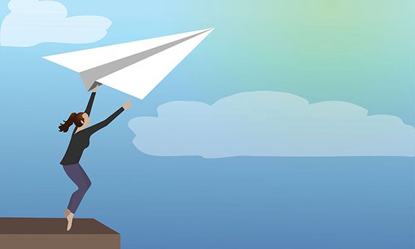 Illustration of a woman about to let go of a giant paper plane into the blue skies
