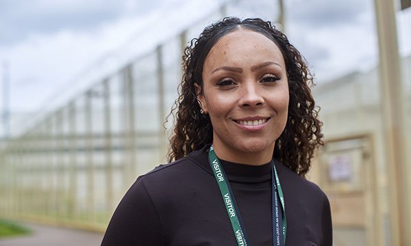 heree-Leigh Woodall, head of equality, diversity and inclusion (EDI) at independent healthcare provider Practice Plus Group, pictured standing outside HMP Oakwood