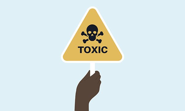 An illustration of a hand holding up a warning sign that says toxic and features a skull and crossbones