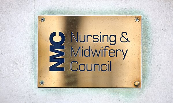 A review of nursing regulator the NMC found institutional bullying, racism and sexism. The NMC plaque is shown
