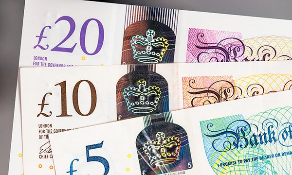Picture of banknotes. This is the earliest the NHS pay review process has been triggered in ten years