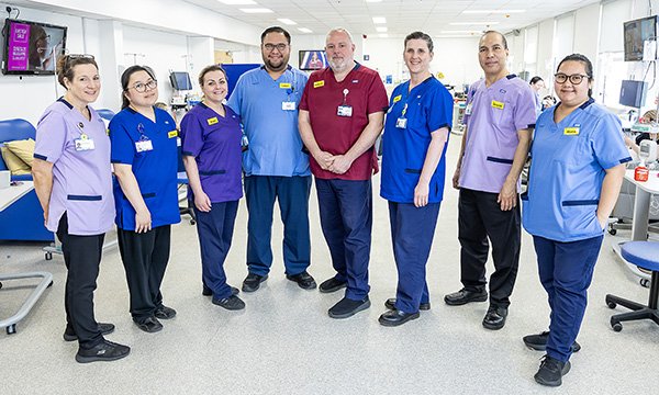 Frimley Health NHS Foundation Trust staff in their new colour-coded uniforms