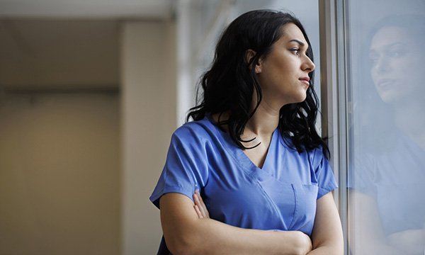 A nurse looking glum. Nearly three in four nursing staff said they feel undervalued in their role.