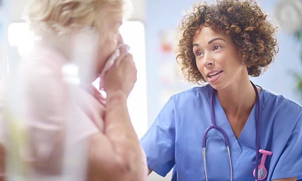 Nurse comforting a patient