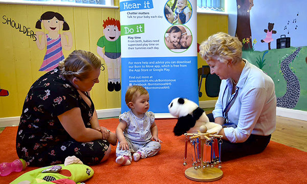 Julia Haynes with a parent and child