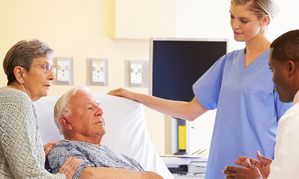 Family and clinicians with patient