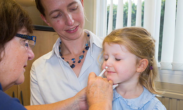 Child receiving flu vaccine