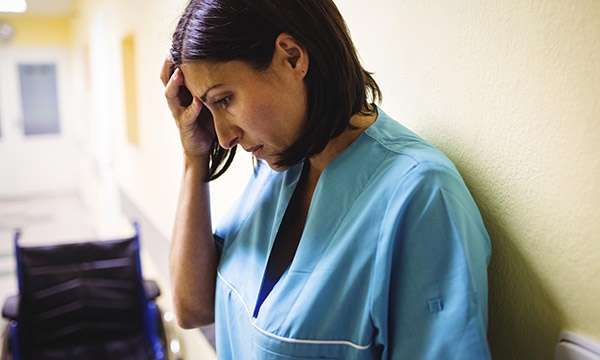 Nurse looking stressed