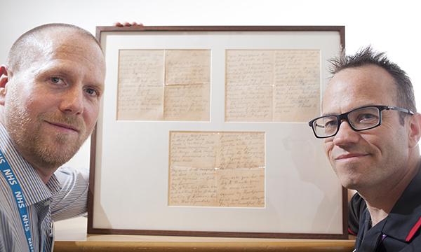 Two men with Nightingale letter