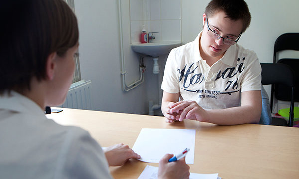 Young male patient consults nurse