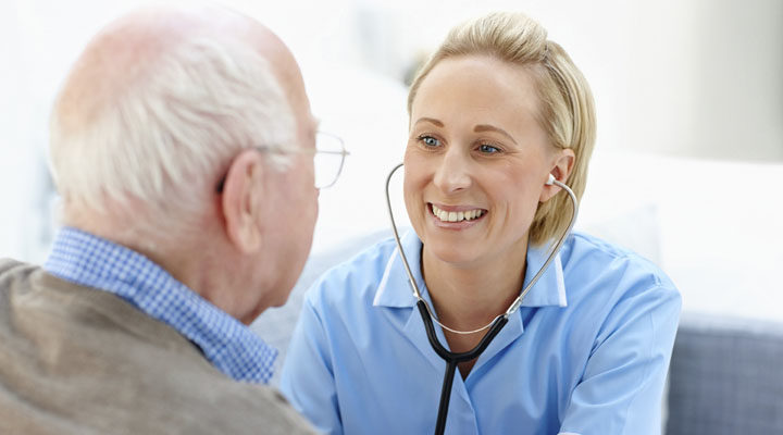 nurse with care home resident