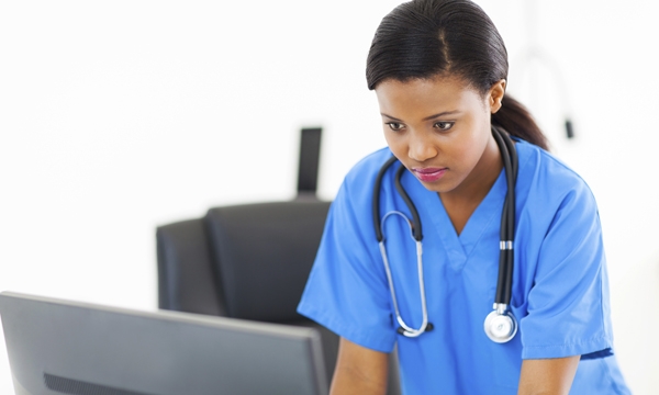 Nurse using computer