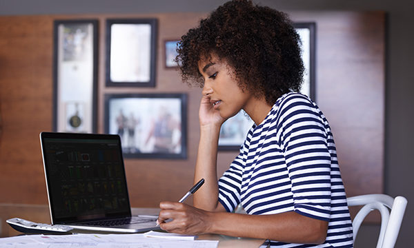 woman works on her laptop