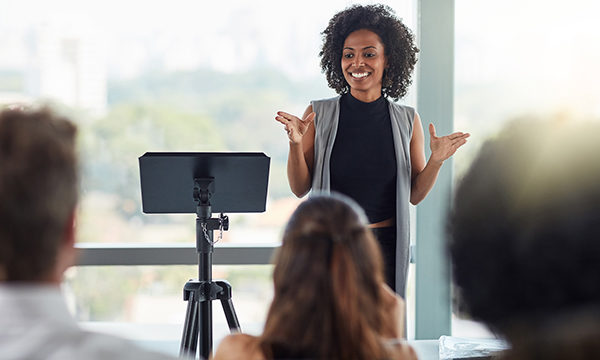 woman presents to conference