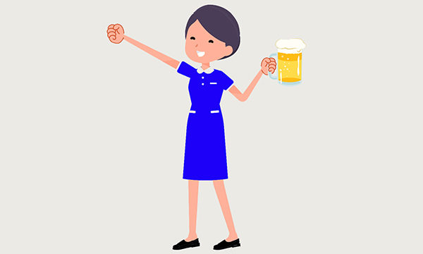 nurse holds a pint glass