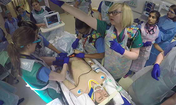 Trauma team with patient