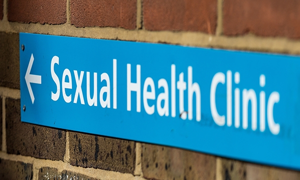 sign pointing to clinic