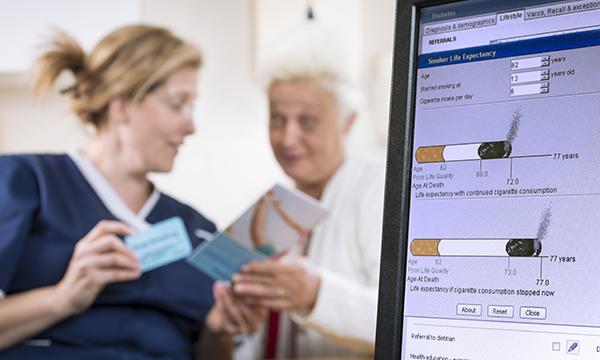 nurse gives stop-smoking advice