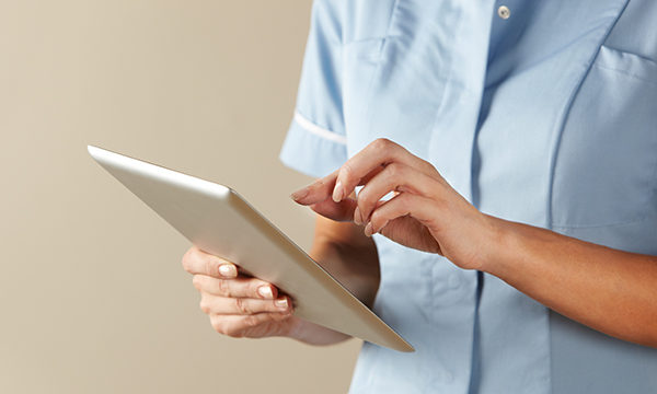 Nurse using ipad