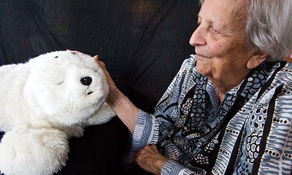 The use of robotic animals in dementia care: challenges and ethical dilemmas